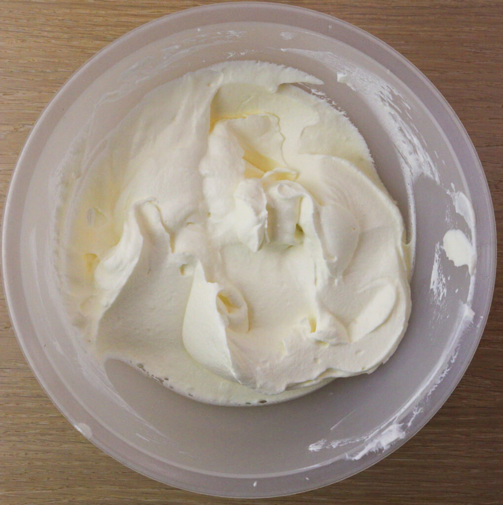image of whipping cream mixed with sugar and cream cheese