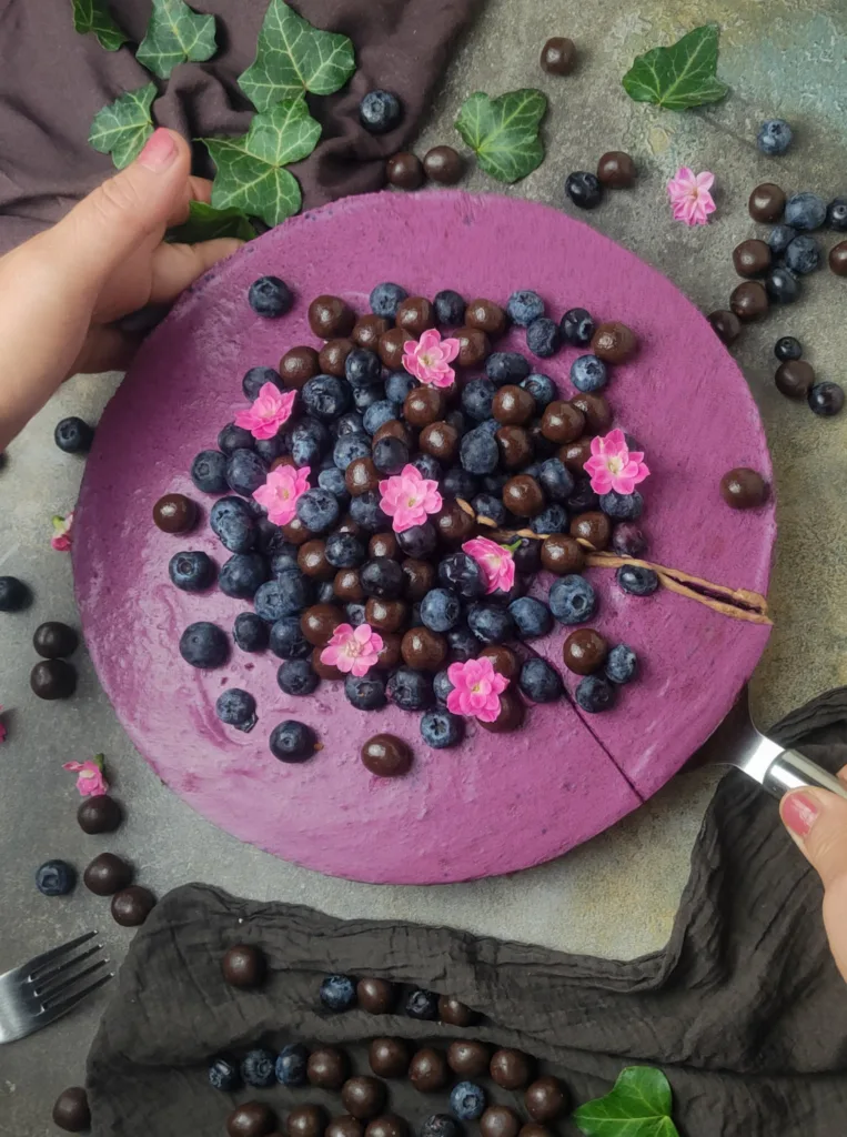 serving blueberry chocolate cake