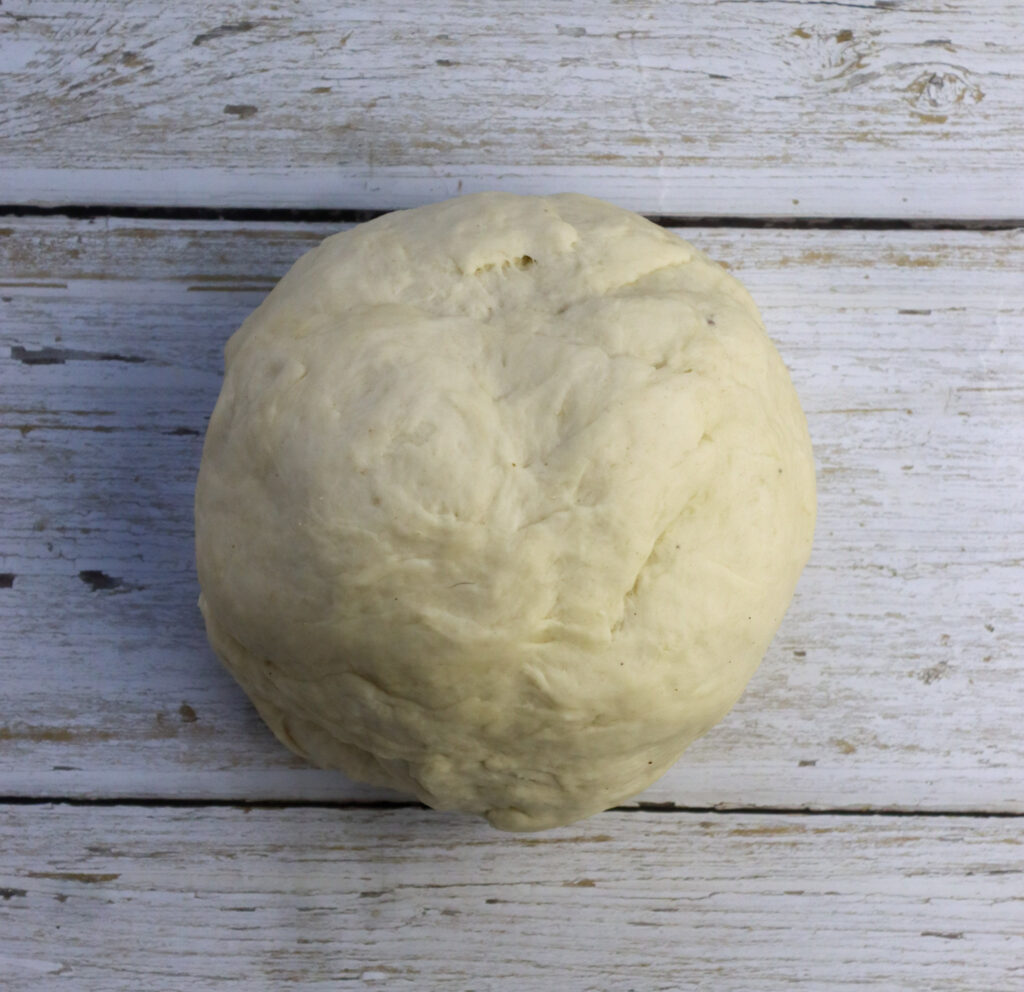 the image of the dough when it's kneaded enough 