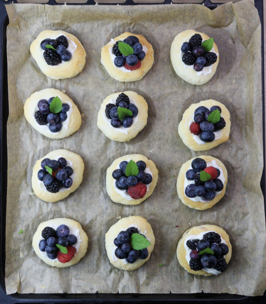image of how to top puff pastry tarts with berries