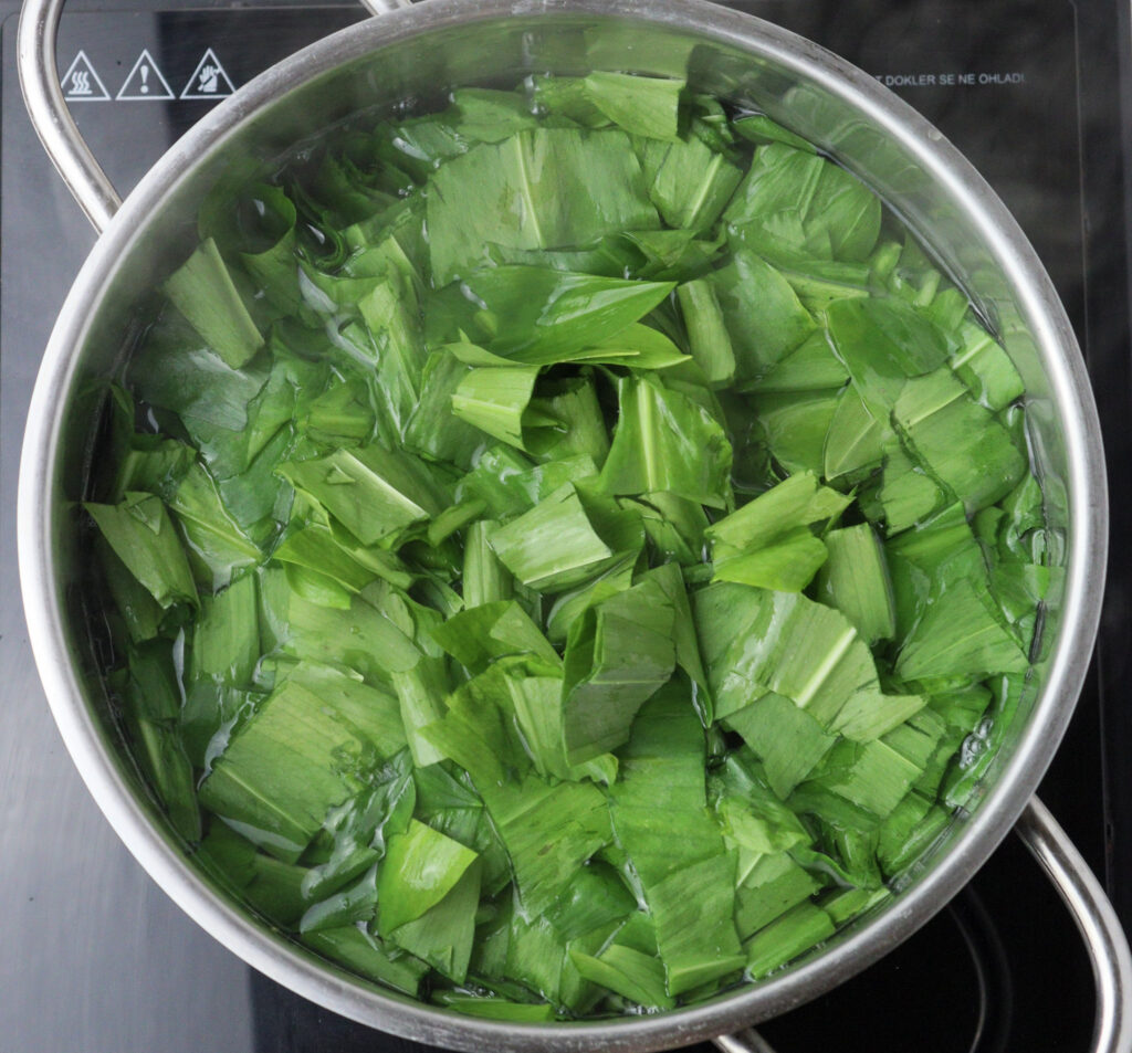 how to blanche wild garlic leaves in a pot of boiling water 